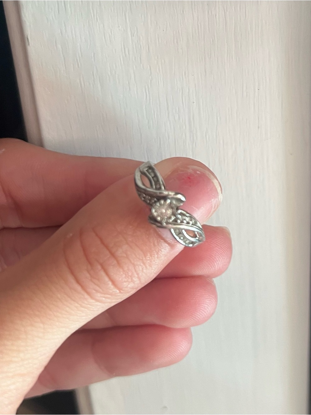 Silver Tone Twisted Band Ring with Clear Center Stone